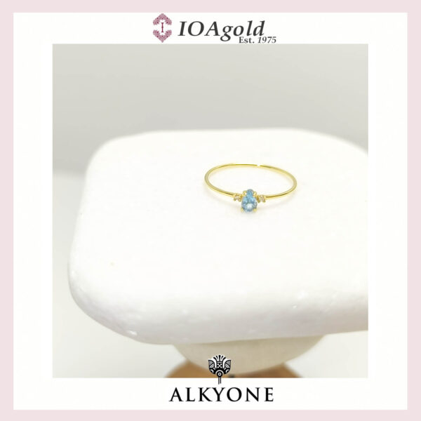 Gold ring 14k Blue Topaz pear stone with 2 diamonds