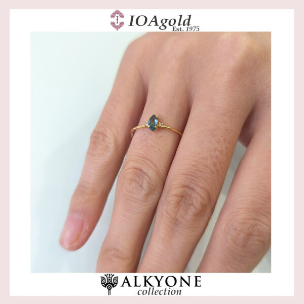 Gold ring 14k with Blue Topaz navette stone and 2 diamonds