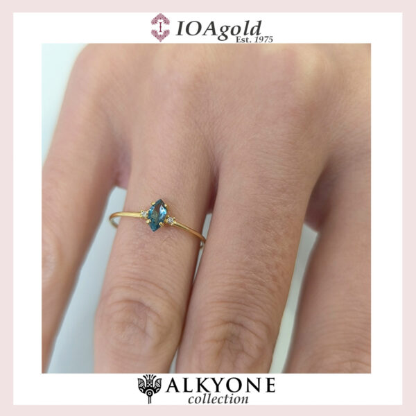Gold ring 14k with Blue Topaz navette stone and 2 diamonds