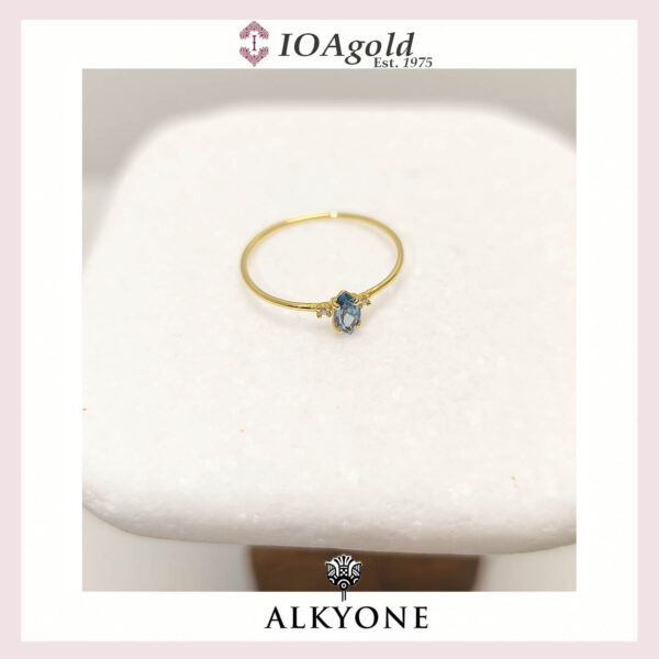 Gold ring 14k with Blue Topaz navette stone and 2 diamonds