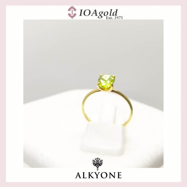 Gold ring 14k with Peridot oval stone