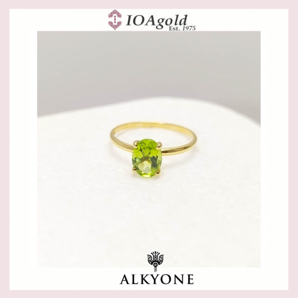 Gold ring 14k with Peridot oval stone
