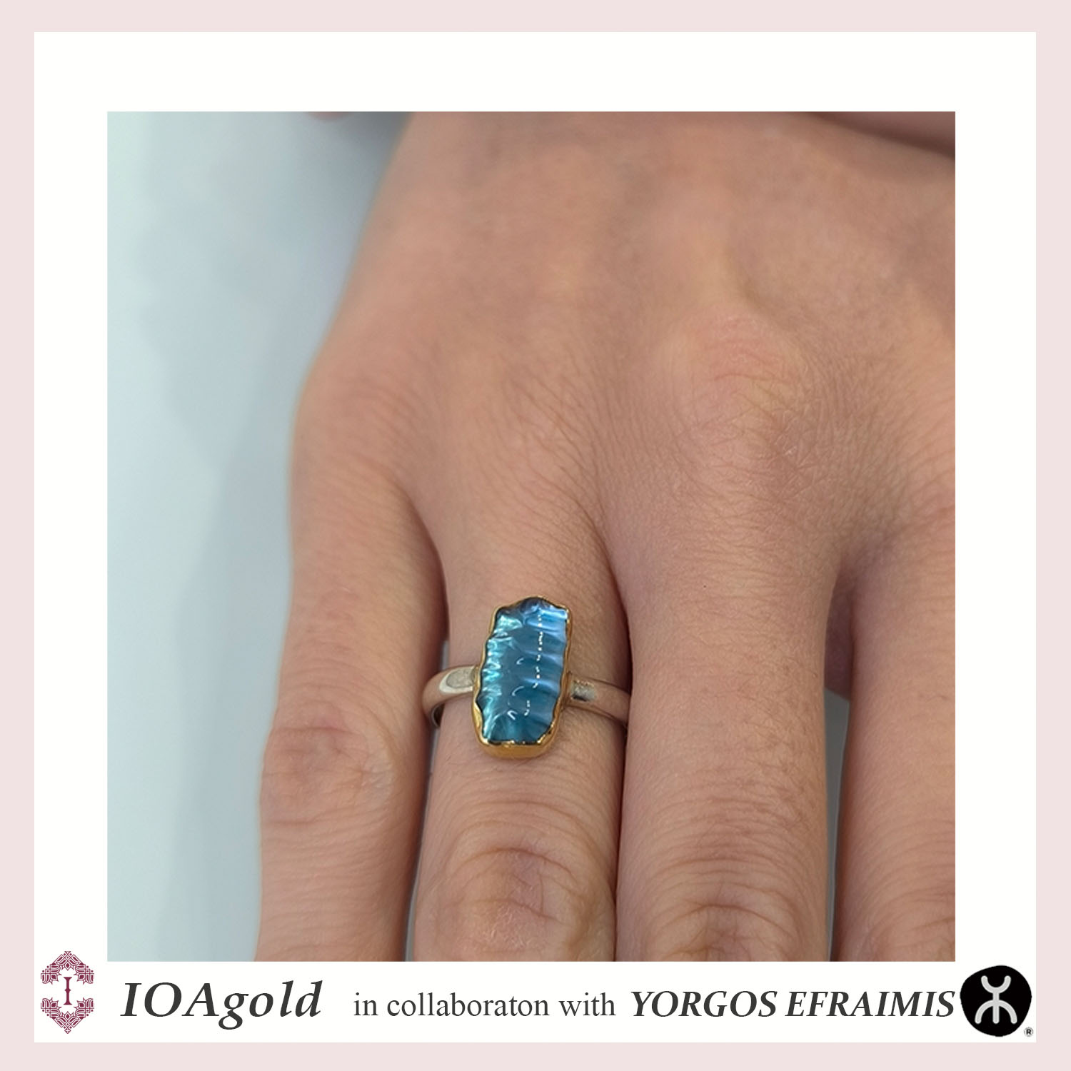 Efr- silver ring with gold 22k bezel Blue topaz close up