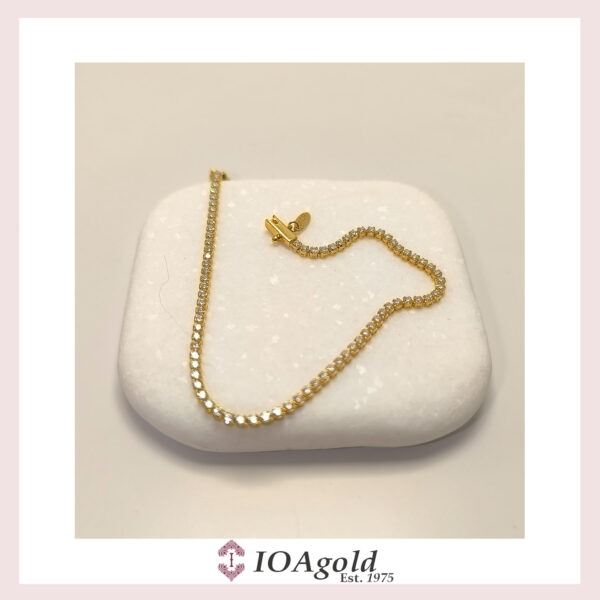 Gold 14k ”tennis”  bracelet with white zirconia stones -bovo1