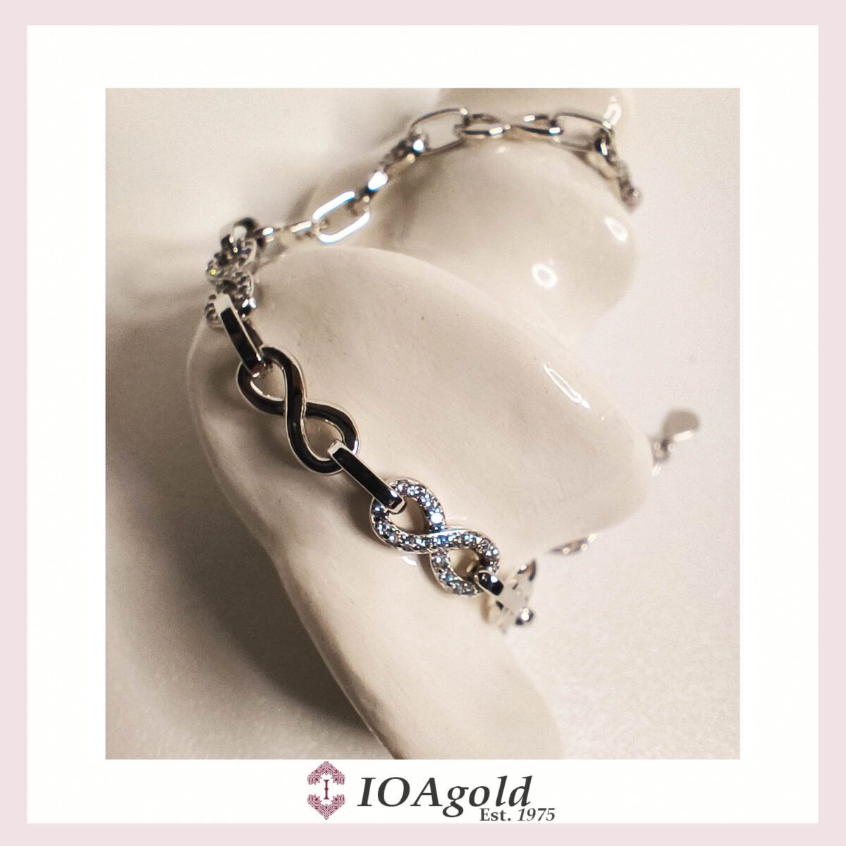 aim-silver bracelet Infinity link with zirconia stones