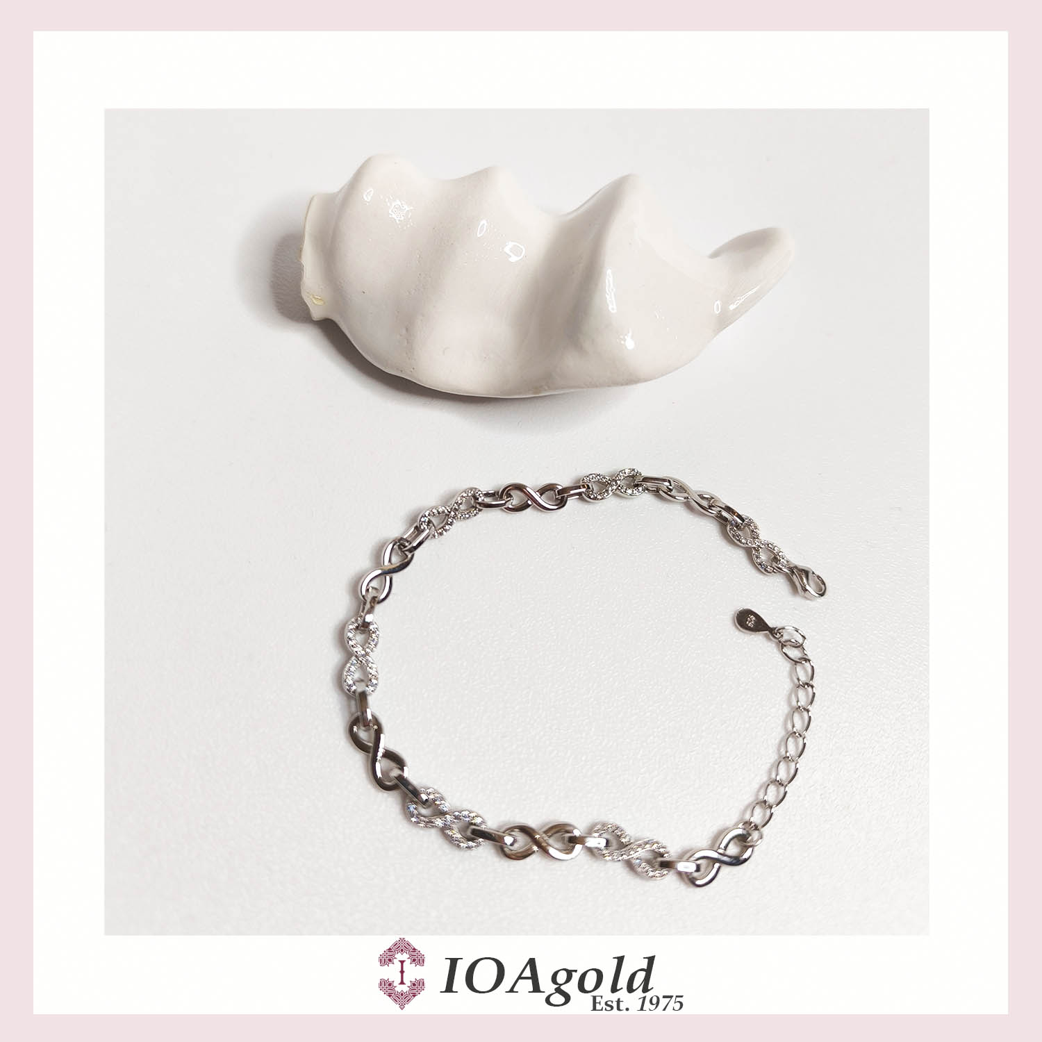 aim-silver bracelet Infinity link with zirconia stones b