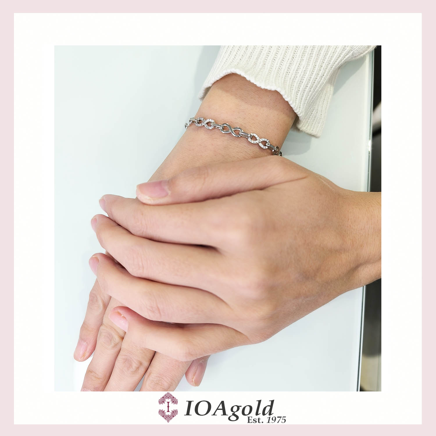 aim-silver bracelet Infinity link with zirconia stones c