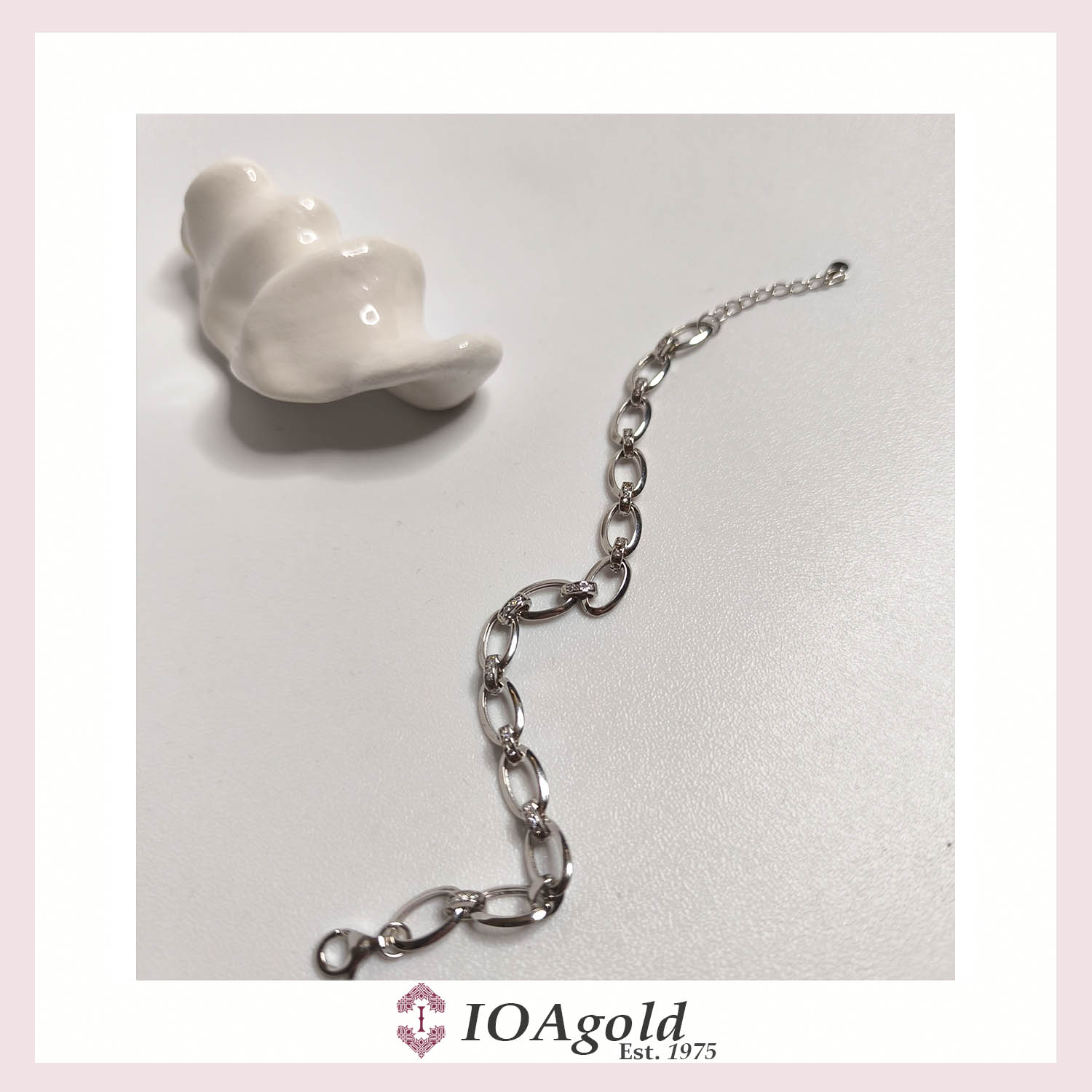 aim-silver bracelet Oval link with zirconia stones