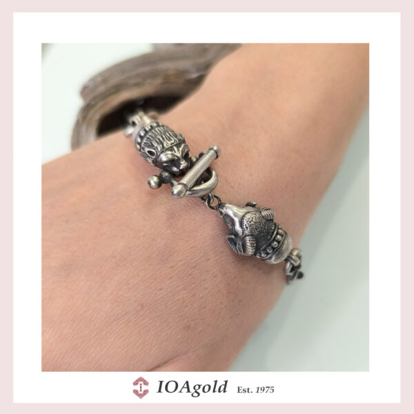 Bracelet with lion and wild ram heads