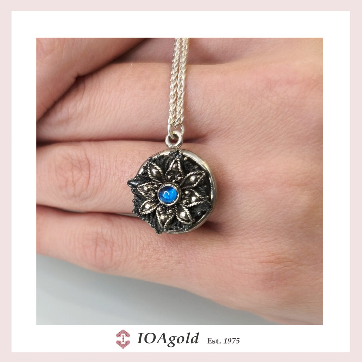 fa- necklace with stone blue close up fa- necklace with stone blue close up