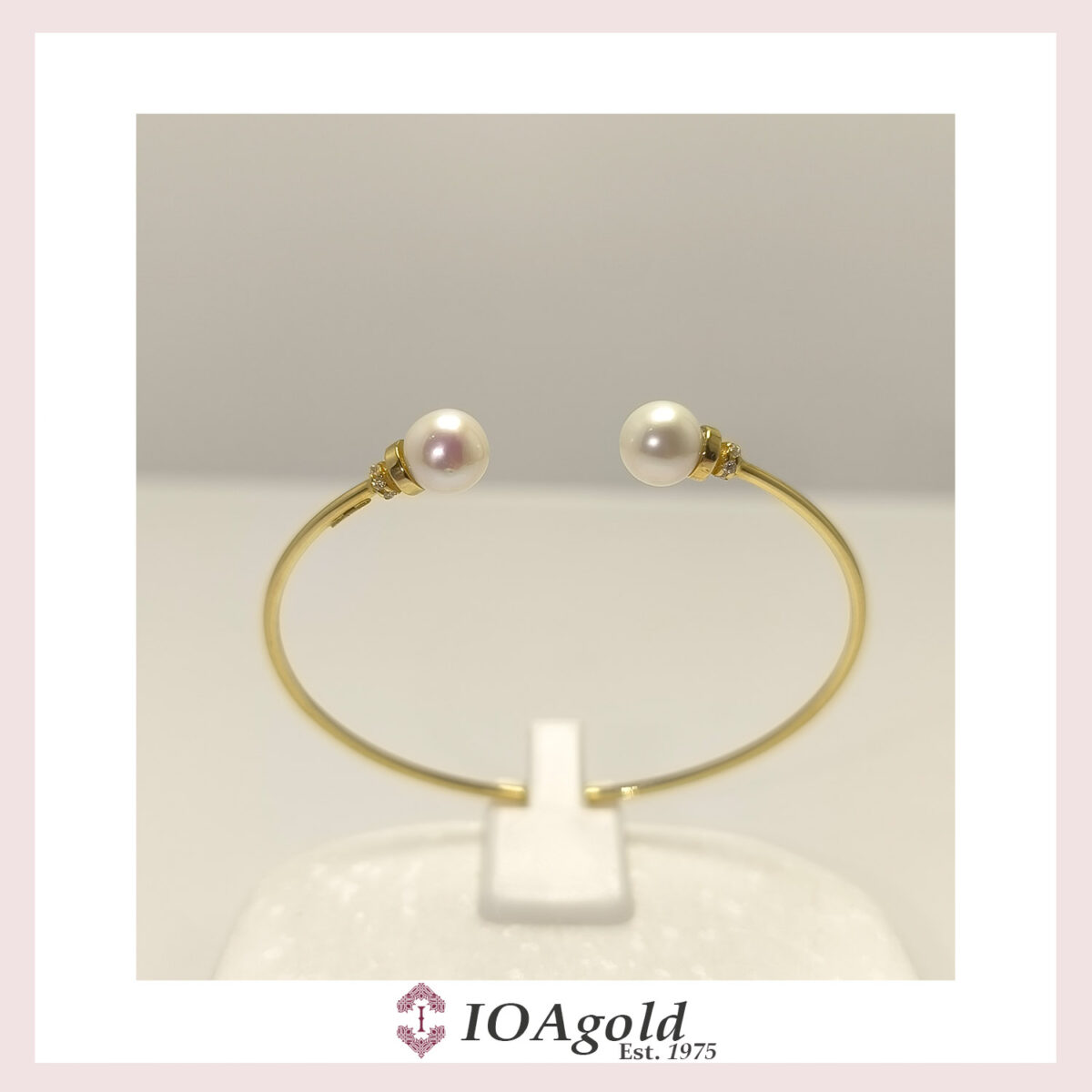 ioa-gold 14k cuff – Pearls and white zirconia stones c